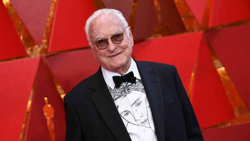 James Ivory with a shirt with Timothee Chalamet on it