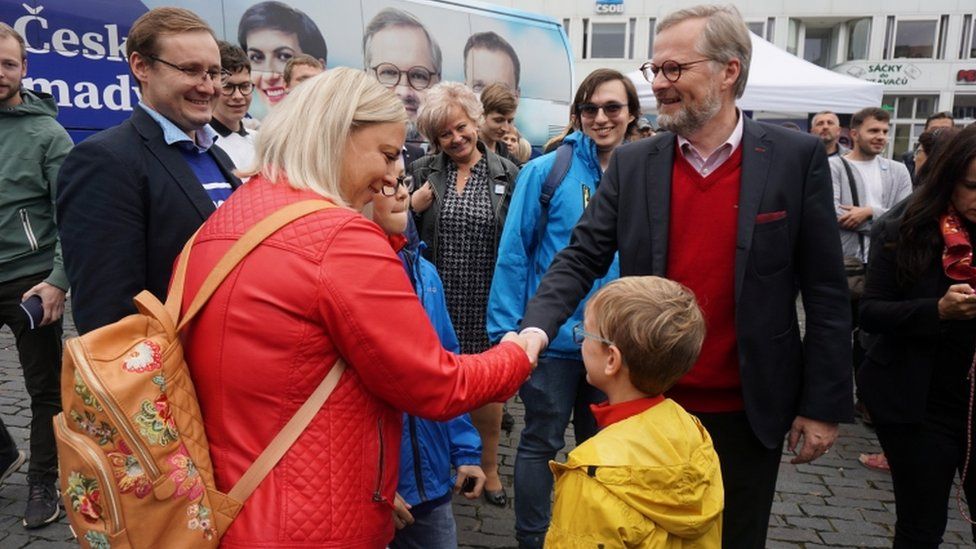 Petr Fiala, leader of the Civic Democratic Party and the Together coalition candidate for Czech prime minister, greets supporters during an election campaign rally in Usti nad Labem, Czech Republic, October 5, 2021.