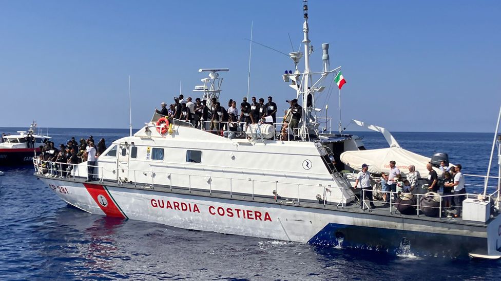 Lampedusa coastguard boats taking people to the site of the tragedy - 3 October 2023