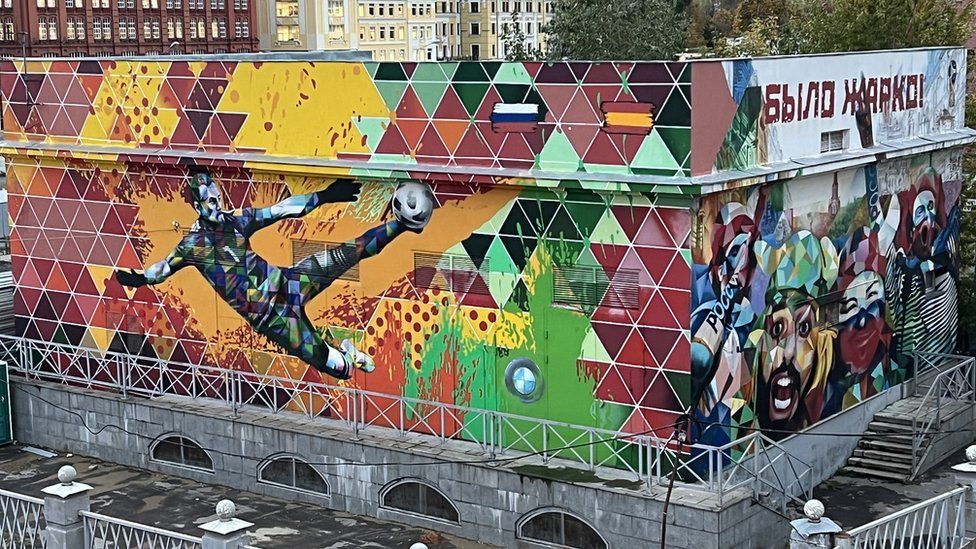 A mural in Moscow showing Russian goalkeeper Igor Akinfeev save penalty in a match against Spain at the 2018 World Cup