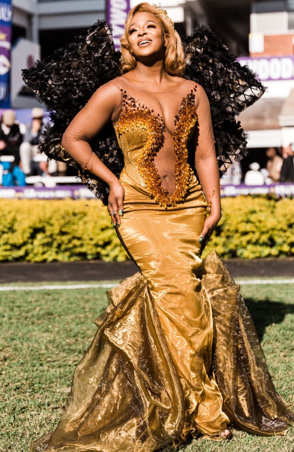 South African actress and celebrity Jessica Nkosi poses for a photographer at the 2022 editon of the Durban July horse race in Durban on July 2, 2022.