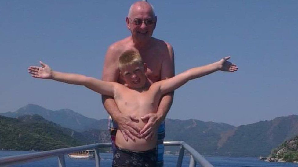 Gareth with grandson Zac on holiday