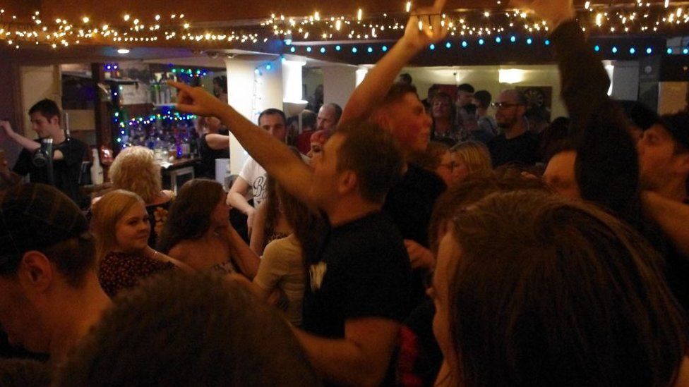 Photo of a packed pub during a previous festival year