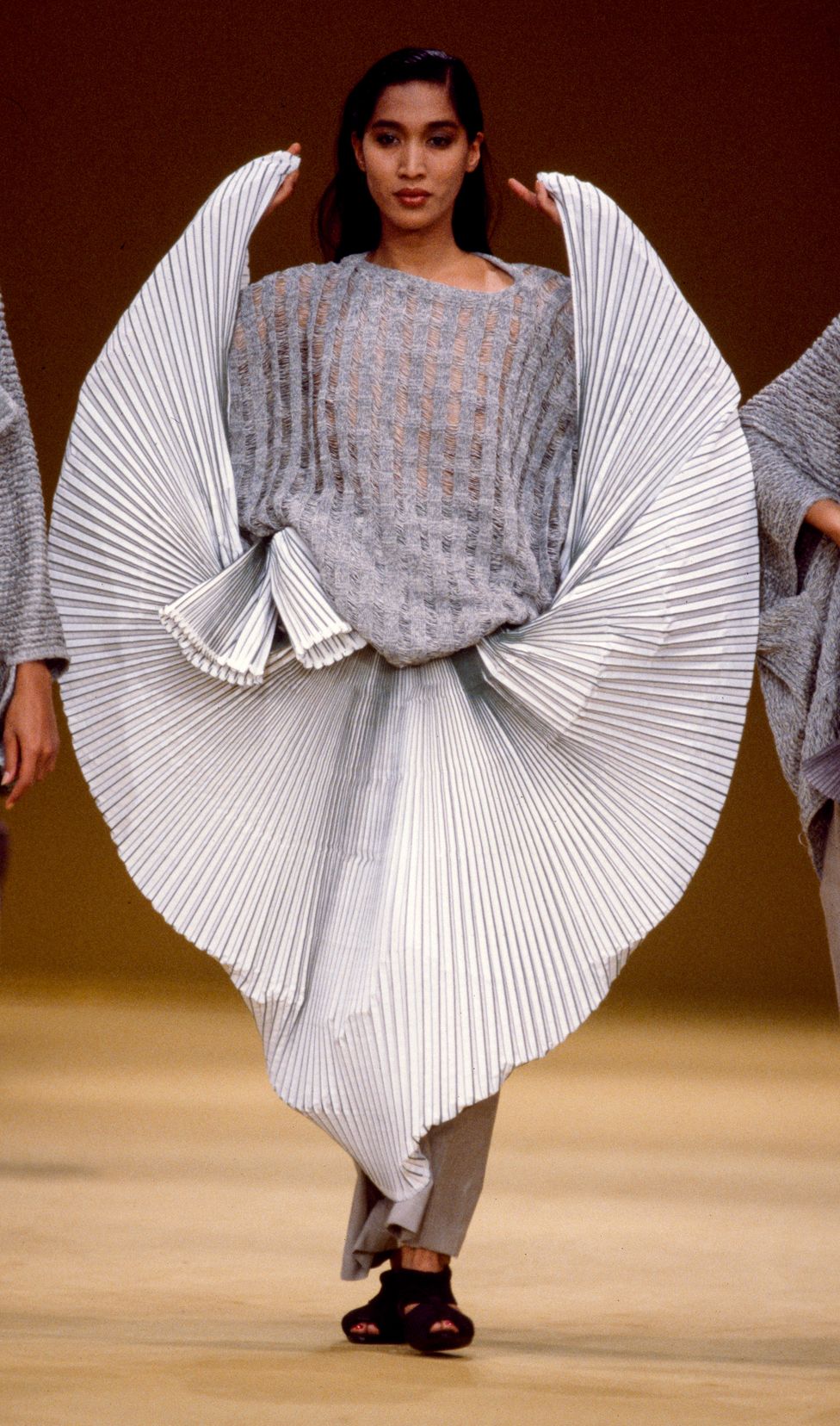 A guest is seen, after the Issey Miyake Men show, during Paris