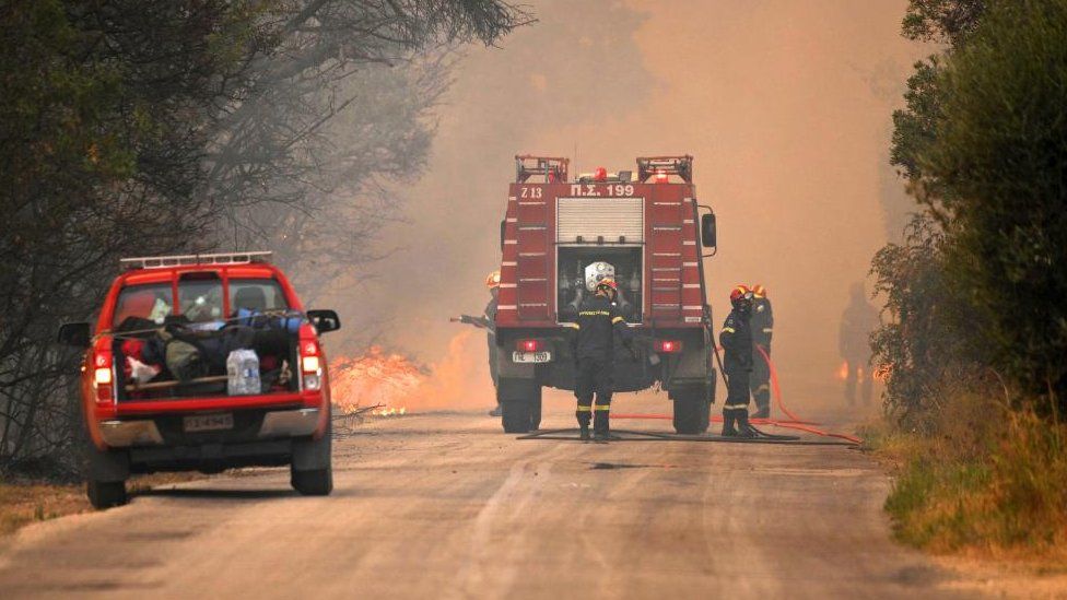 Firefighters operate to put out a wildfire in Avantas village,, Alexandroupolis, Thrace, northern Greece, 22 August 2023.