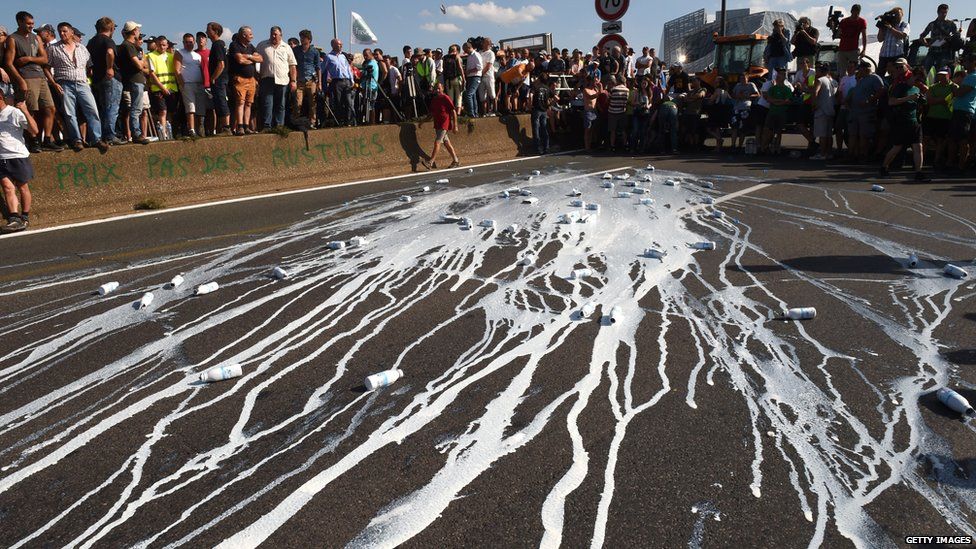 milk on streets in farmers protest