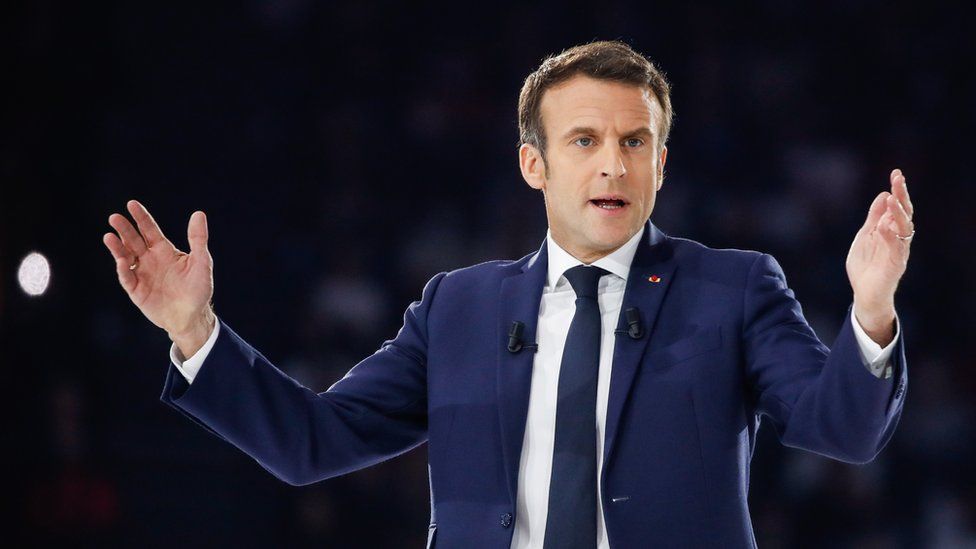 Emmanuel Macron appears at a rally at Paris La Defense Arena in Nanterre, France, April 2, 2022