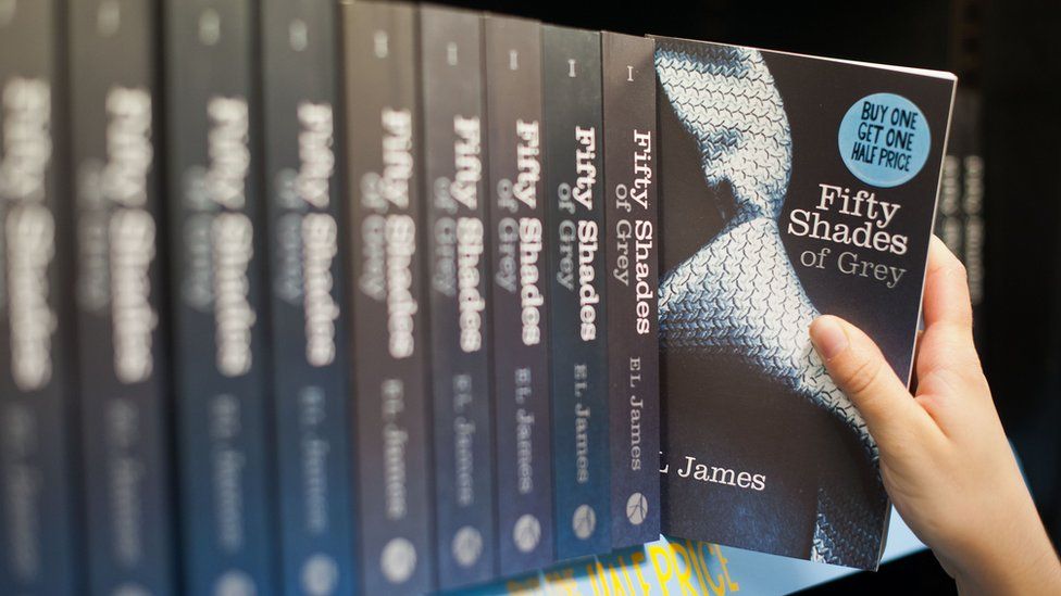Numerous copies of Fifty Shades of Grey