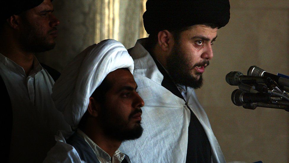 Moqtada Sadr delivers a speech condemning the US occupation of Iraq in Kufa (1 August 2003