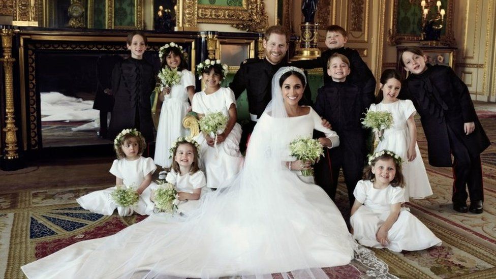 group photograph of Prince Harry and Meghan surrounded by bridesmaids and pageboys