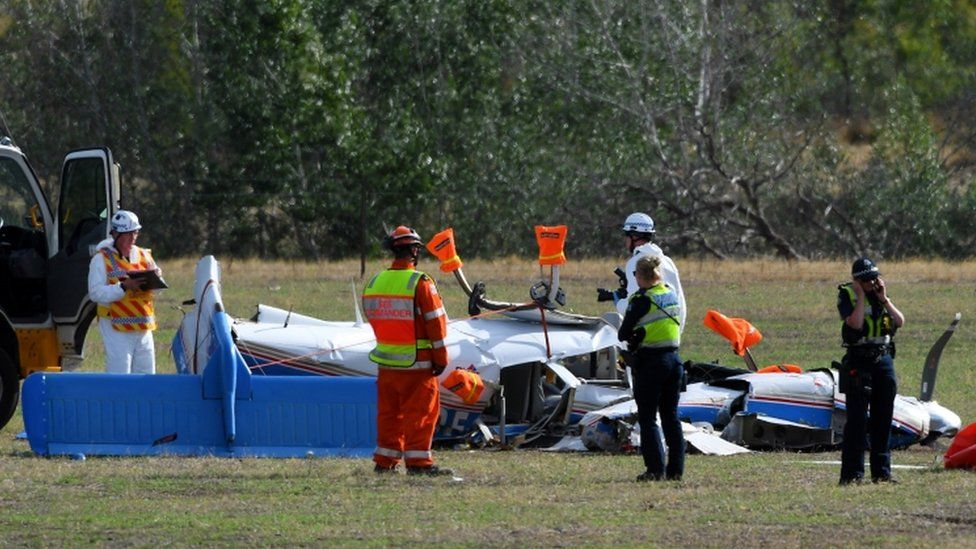 Rescue workers attend one of the planes