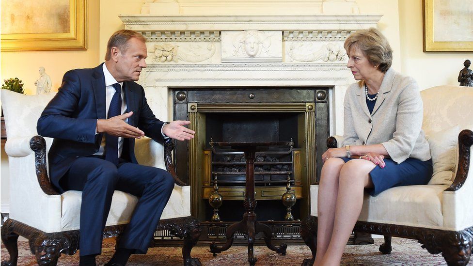 British Prime Minister Theresa May (R) speaks to President of the European Council Donald Tusk (L) during their meeting at 10 Downing Street in London, Britain, 08 September 2016.