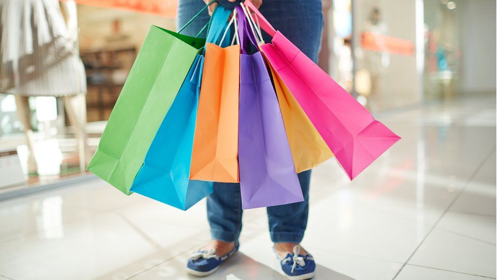 Woman with shopping bags, generic