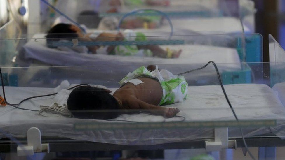 In this photograph taken on April 26, 2016, newly born babies lie in a maternity ward at a government hospital in Gwalio