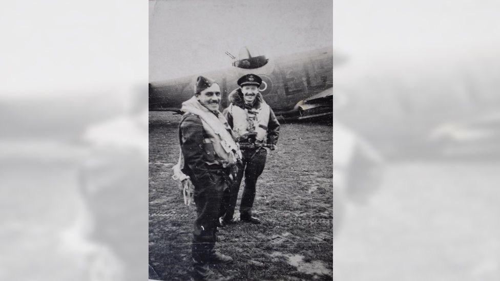 Flt Lt Vivian Phillips (left) in front of his Lockheed Ventura aircraft