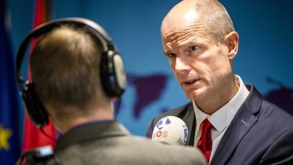Stef Blok talks to journalists in the parliament in The Hague on 8 January