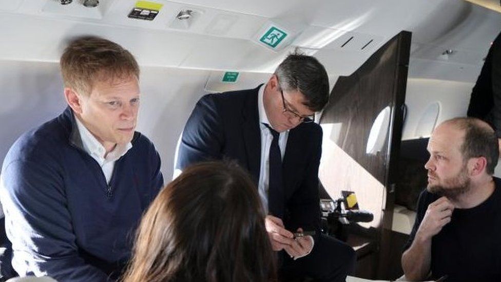 Defence Secretary Grant Shapps and reporters on board the aircraft for the Poland trip
