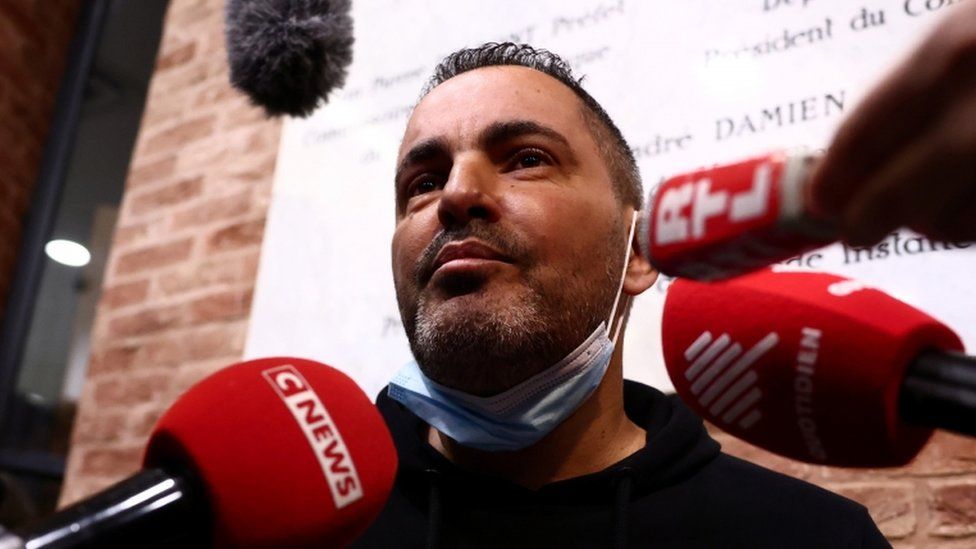 Mustapha Zouaoui answers questions to journalists before the start of his trial with Real Madrid soccer team player Karim Benzema