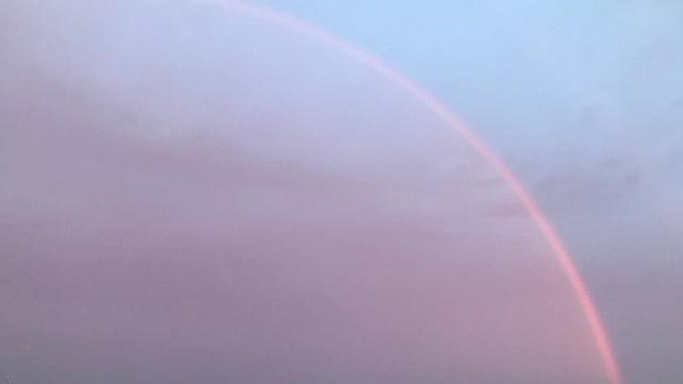 Pink rainbow over Dorchester, Dorset