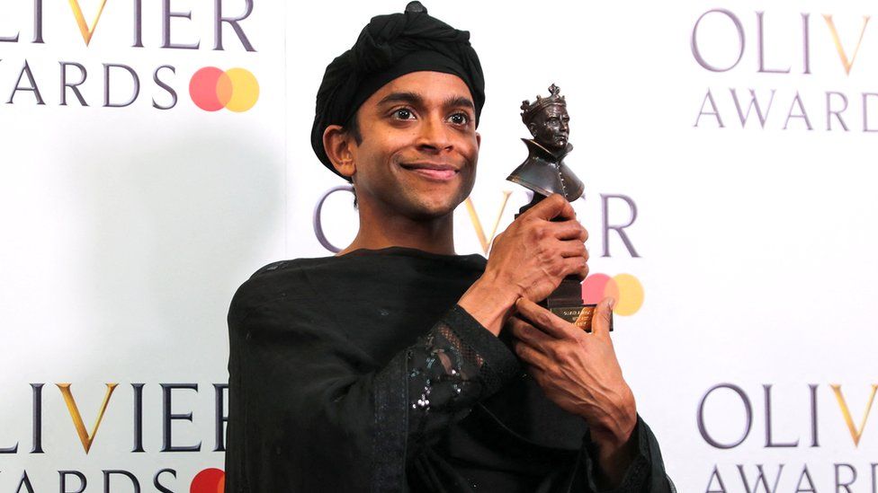 Hiran Abeysekera, winner of the best actor award for Life of Pi, poses at the Olivier Awards in the Royal Opera House in London