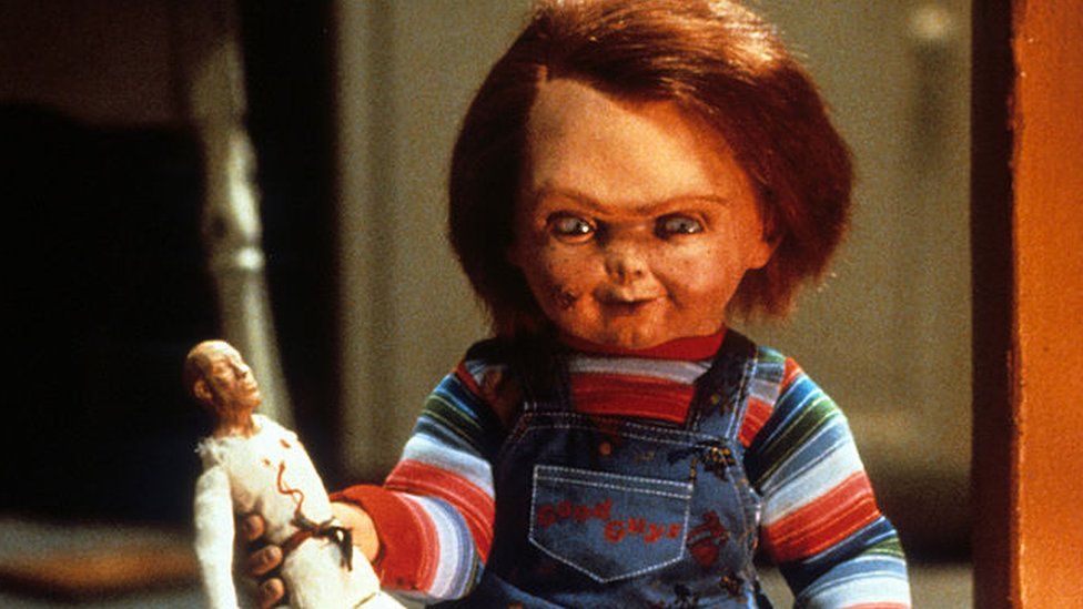 Chucky with doll in a scene from the film 'Child's Play', 1988