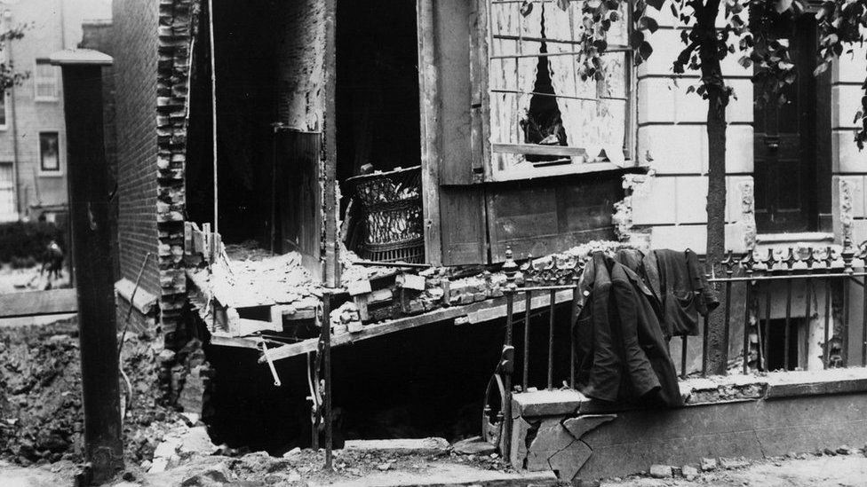 July 1915: A house in Shoreditch, London with half of its facade missing after a Zeppelin raid during World War I.