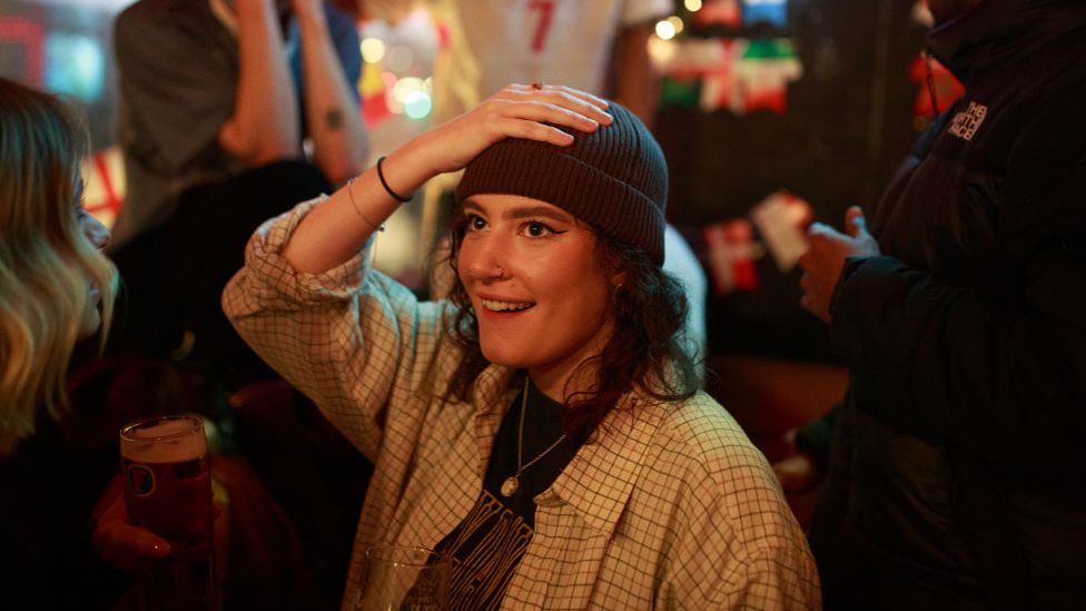 Woman watches England World Cup match