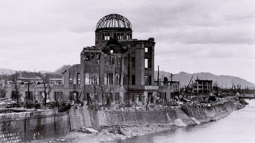 The gutted Hiroshima Prefectural Industrial Promotion Hall, currently known as Atomic Bomb Dome or A-Bomb Dome, is seen near Aioi Bridge in Hiroshima after the atomic bombing