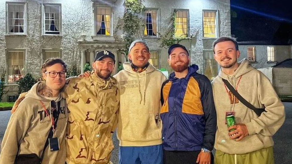 Dermot Kennedy pictured with the barbers from Bareknuckle Barebershop