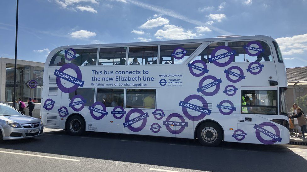 London bus with words "this bus connects to the new Elizabeth line" written on side