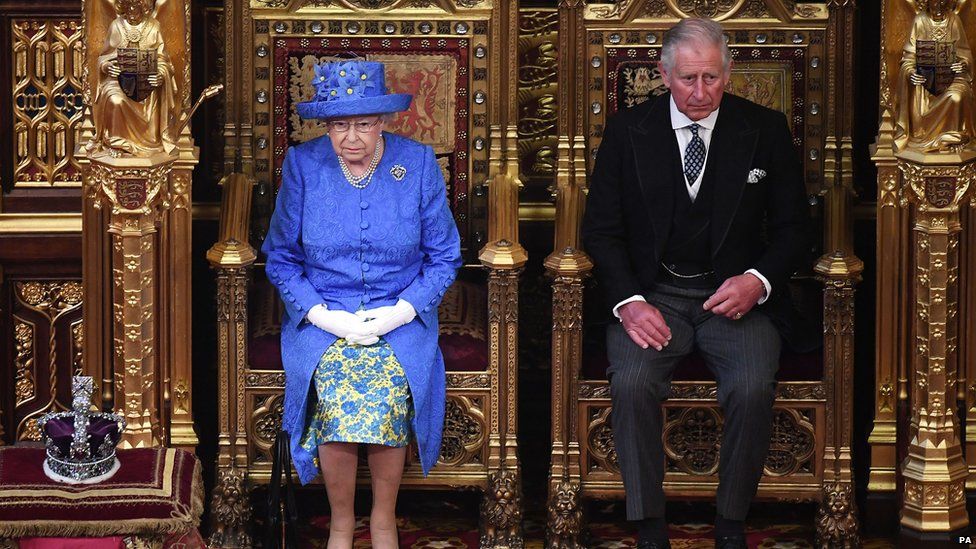 The Queen accompanied by Prince Charles