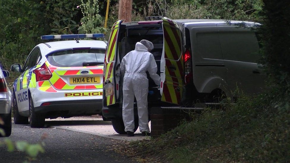 Police and forensics were still investigating the scene of the crime on Saturday