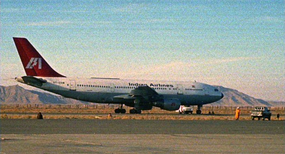 A hijacked Indian Airlines jetliner parks on the tarmac of Kandahar airport in southern Afghanistan on Sunday December 26, 1999.