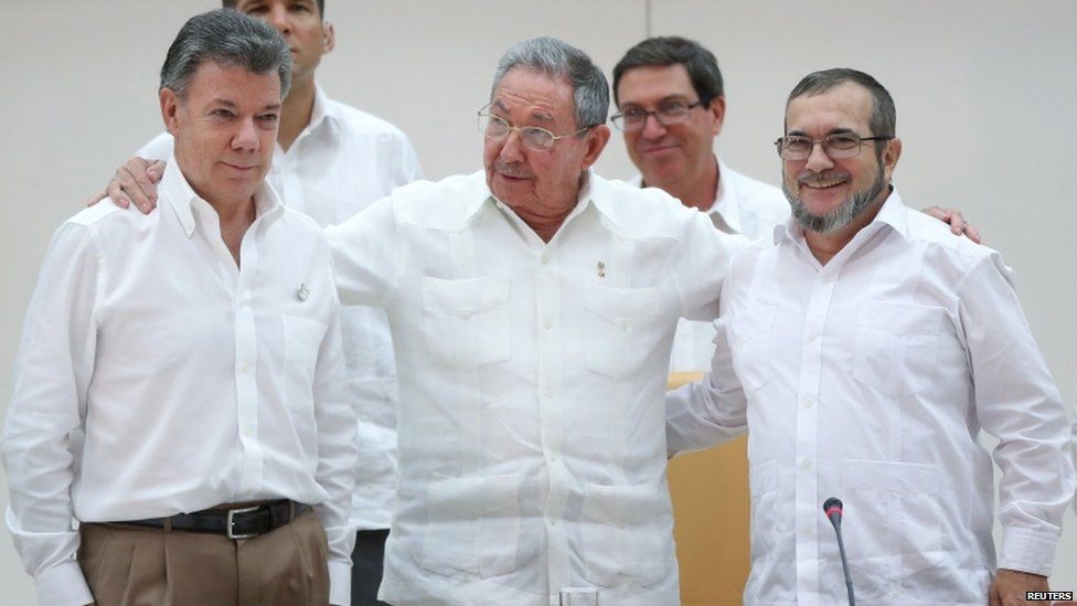 Cuban President Raul Castro (centre) facilitated the first meeting between Mr Santos (left) and Timochenko (right) last month