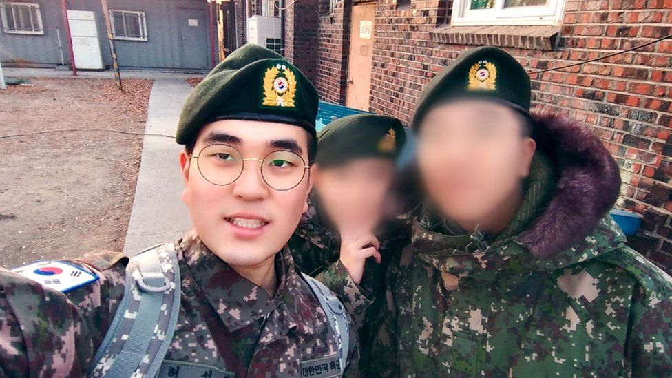 BTS' j-hope holds gun in latest army photo