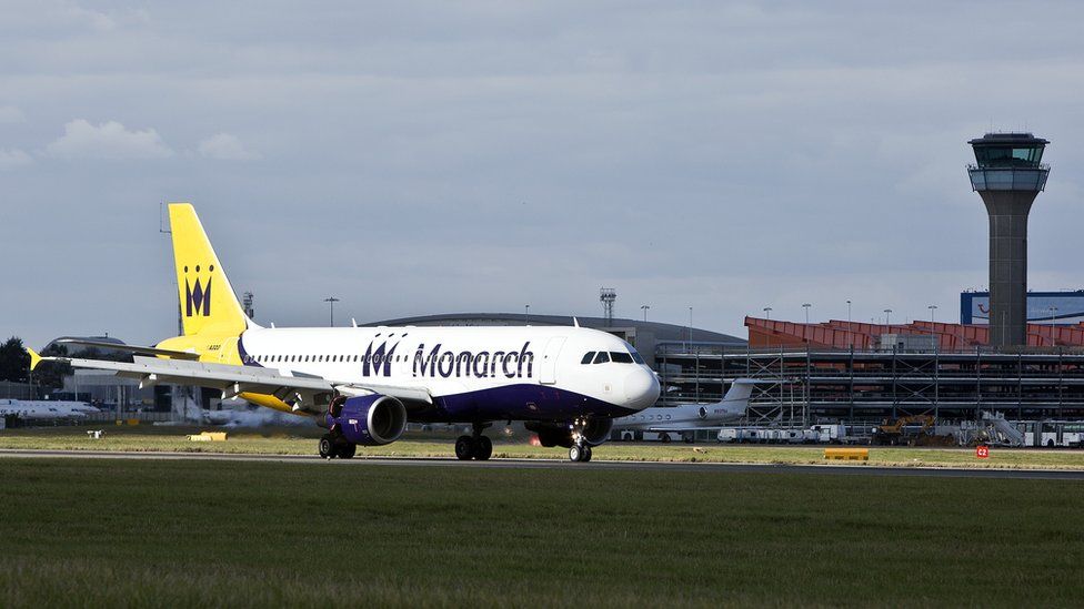 Monarch plane on ground