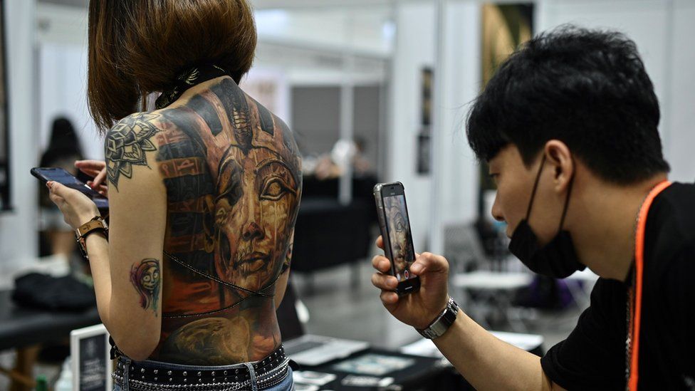 Malaysian Minister Criticises Obscene Half Naked Tattoo Show In Kuala Lumpur Bbc News