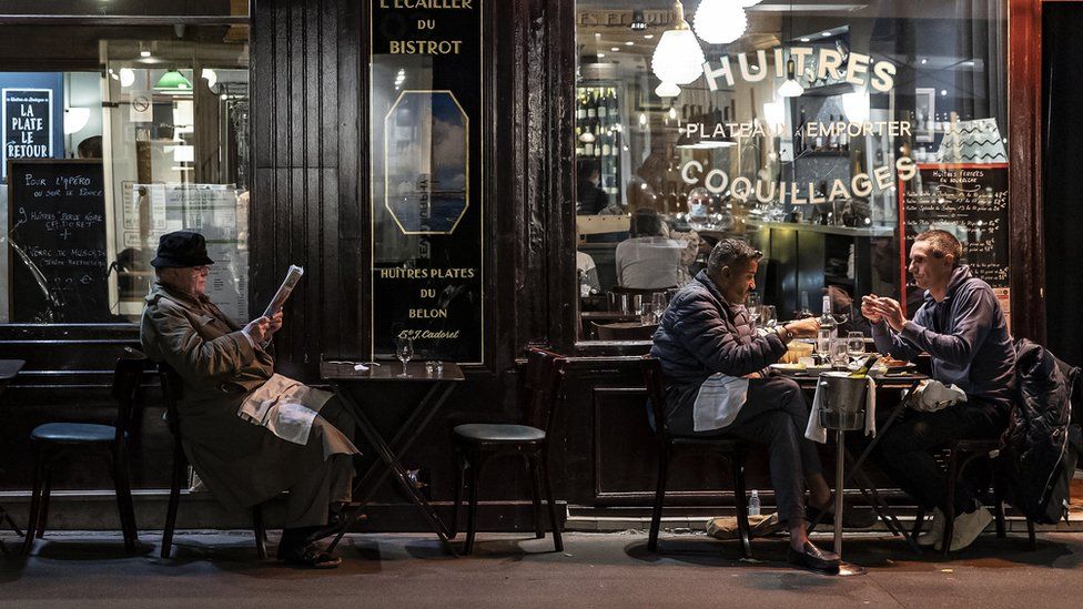 People dine out in Paris on the eve of a second national lockdown in France