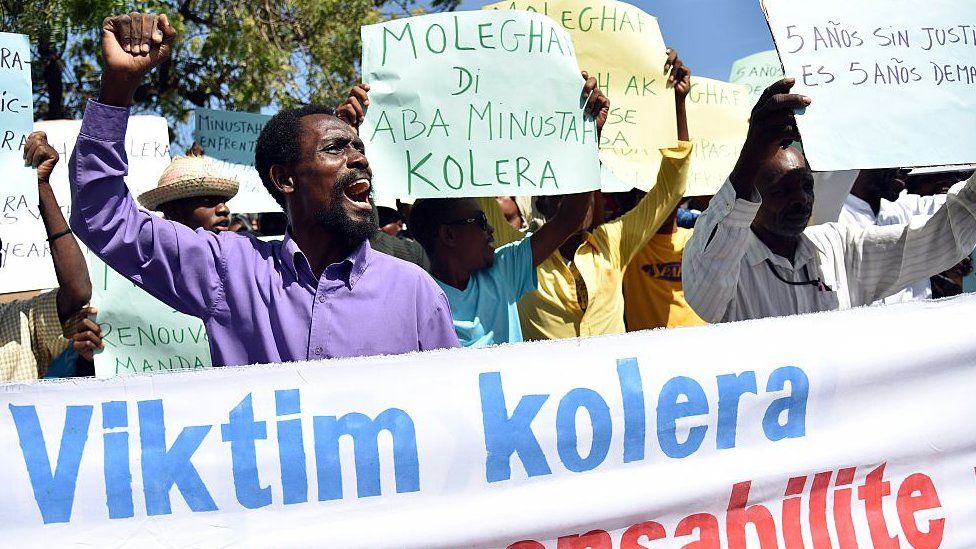 Haitian human rights and victims of cholera in Haiti rally in front of the Log Base of Minustah (United Nations Stabilization Mission in Haiti), in Port-au-Prince, on October 15, 2015