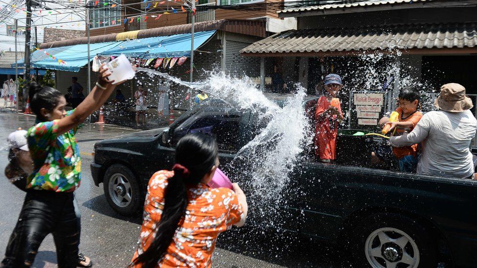 Songkran: Thailand celebrates Buddhist new year with water fights - BBC News