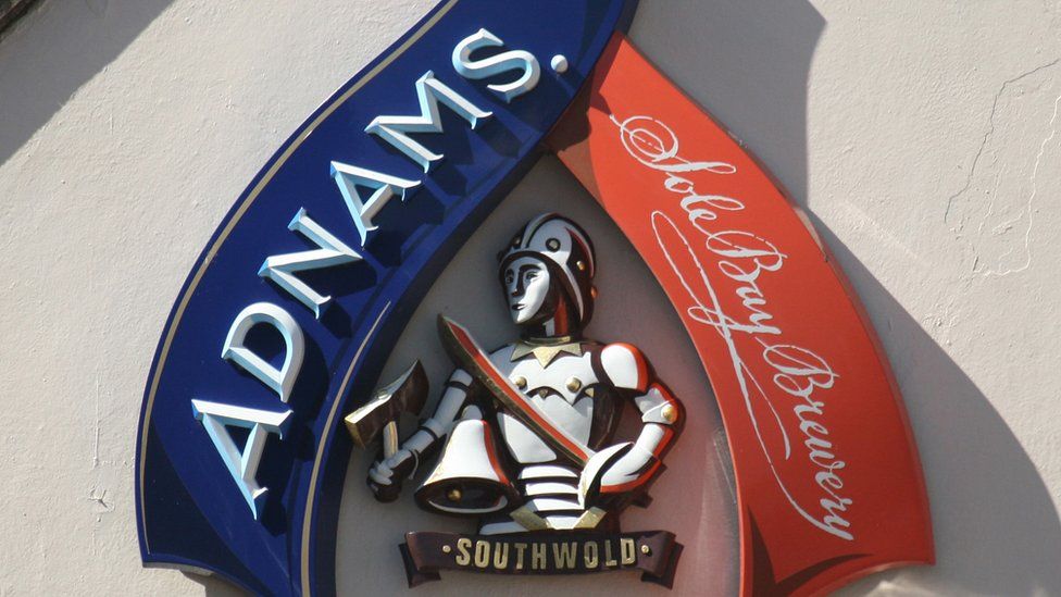 An Adnams brewery sign on a pub in Aldeburgh.
