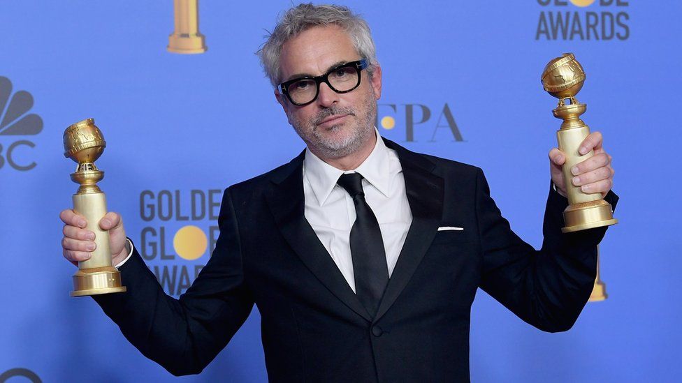 Alfonso CuarÃ³n poses poses in the press room during the 76th Annual Golden Globe Awards