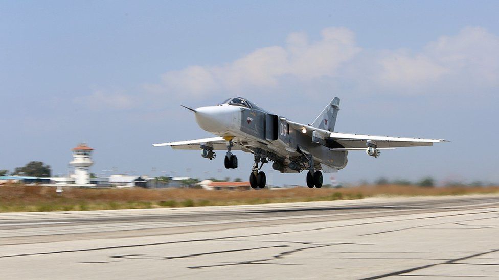 A file picture taken on 3 October 2015 shows a Russian Sukhoi Su-24 bomber taking off from the Hmeimim airbase in the Syrian province of Latakia