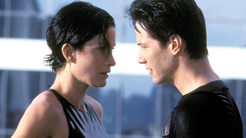 Carrie-Anne Moss and Keanu Reeves in The Matrix Reloaded