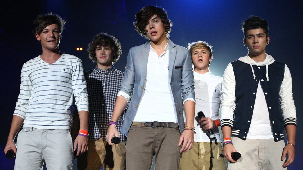 One Direction on stage in 2011