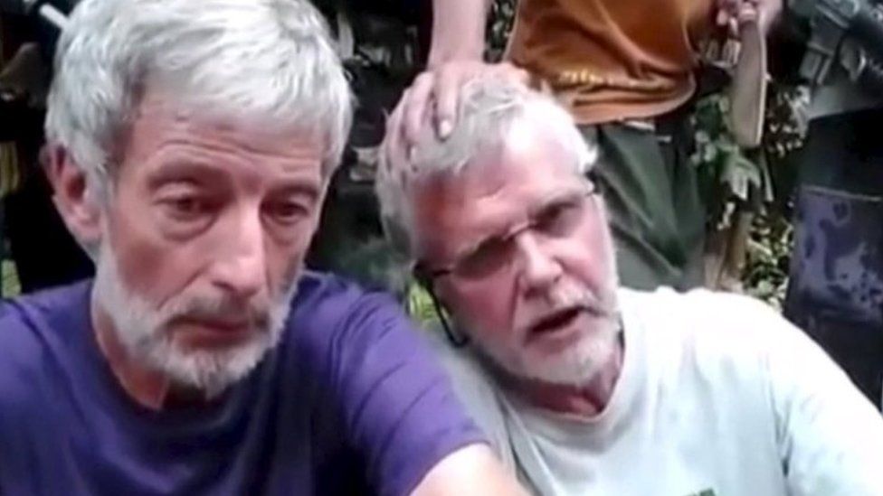 A still image captured from video footage of Philippine jihadis and kidnap victims is shown in this SITE Intelligence Group video made available to Reuters on 13 October 2015