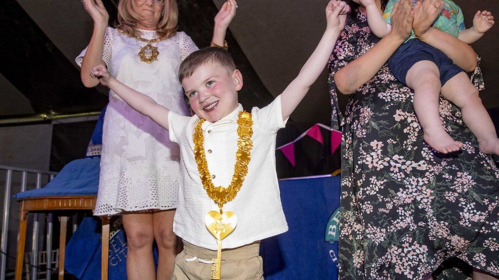 Dáithí Mac Gabhann celebrates with a key to the city around his neck