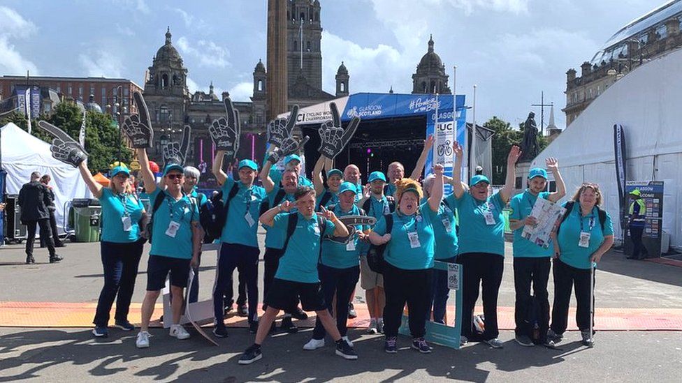 Volunteer group posing in George Square