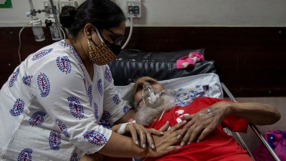 A father and daughter at a hospital in Delhi