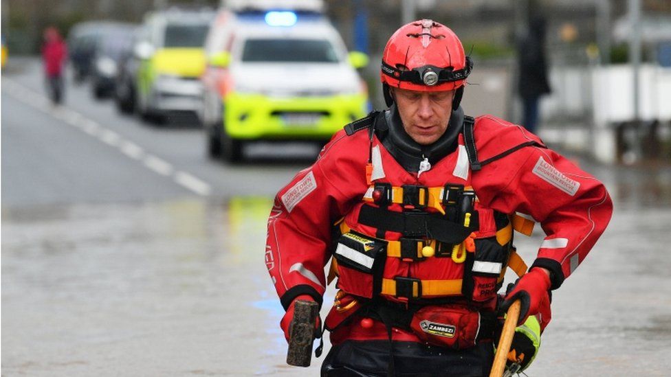 Mountain rescue workers have been working to save people from their homes